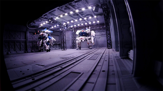 Illustration for article titled Model Hangars Look Much Better With Tiny Mecha Inside